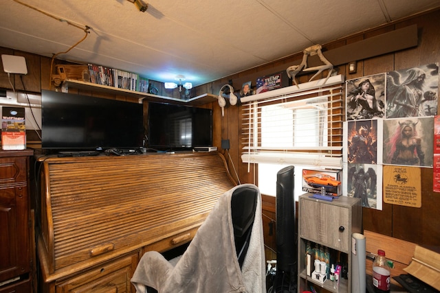 home office with wood walls