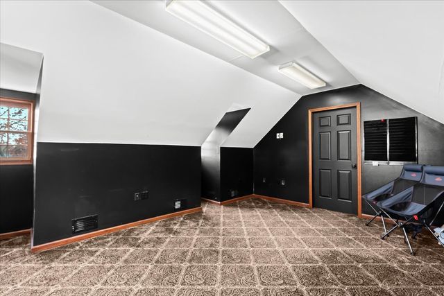 1807 Samoset Rd, Royal Oak, MI 48073 - bonus room with carpet flooring, baseboards, visible vents, and lofted ceiling