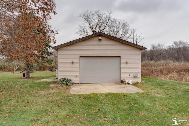 garage with a lawn