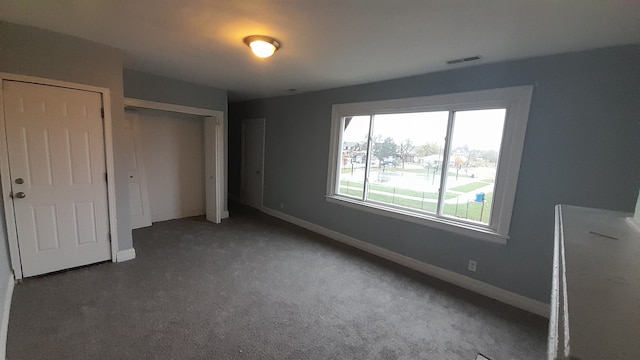 unfurnished bedroom with carpet