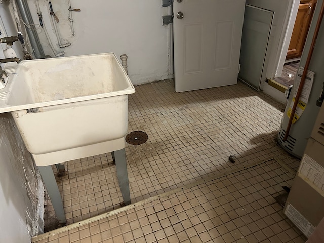 bathroom with tile patterned floors and sink