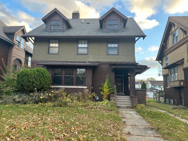 view of front of home featuring a front lawn