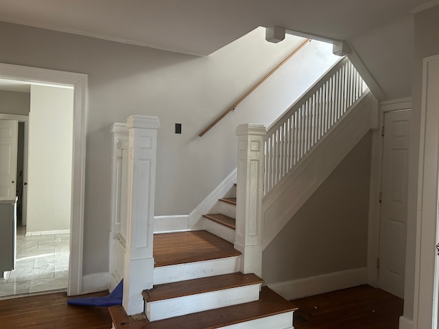 stairway with wood-type flooring