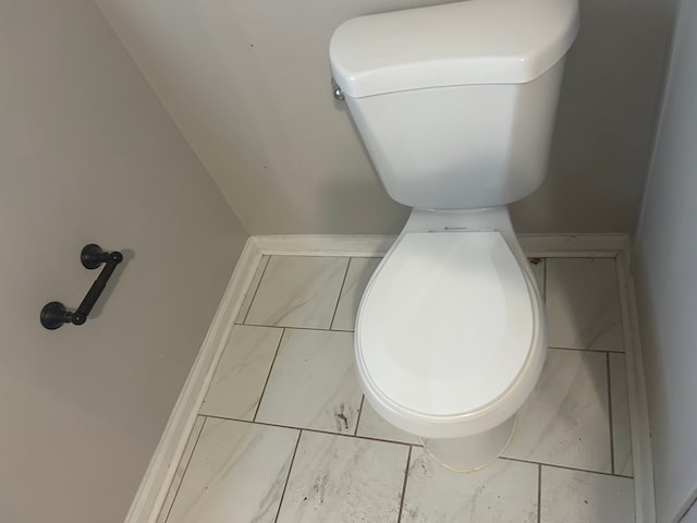 bathroom featuring toilet