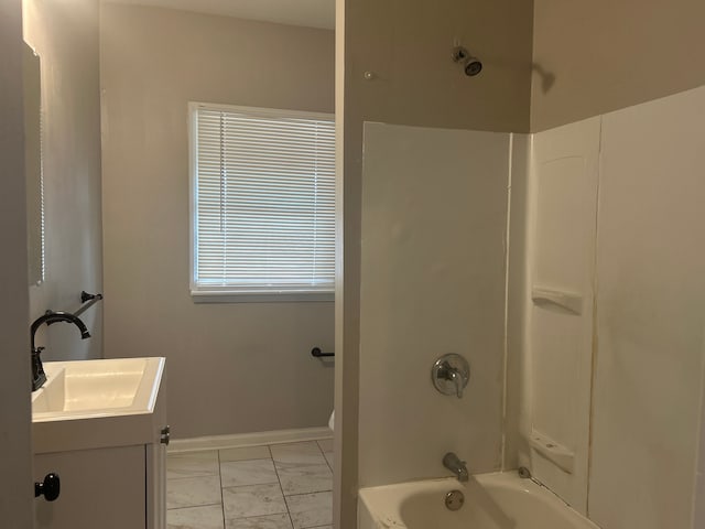 bathroom with vanity and shower / bathtub combination