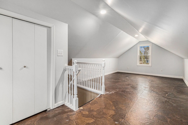 bonus room featuring vaulted ceiling