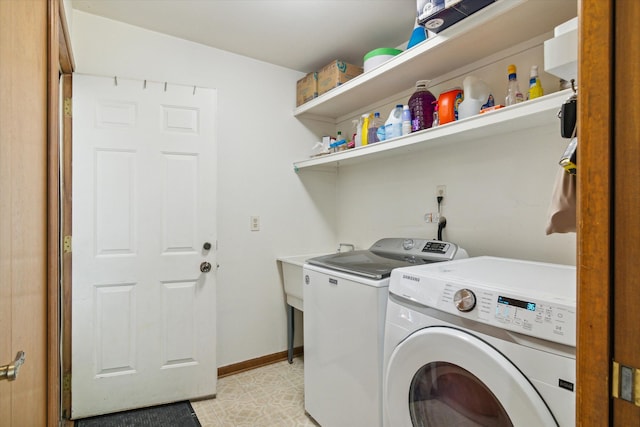 laundry area featuring washing machine and dryer