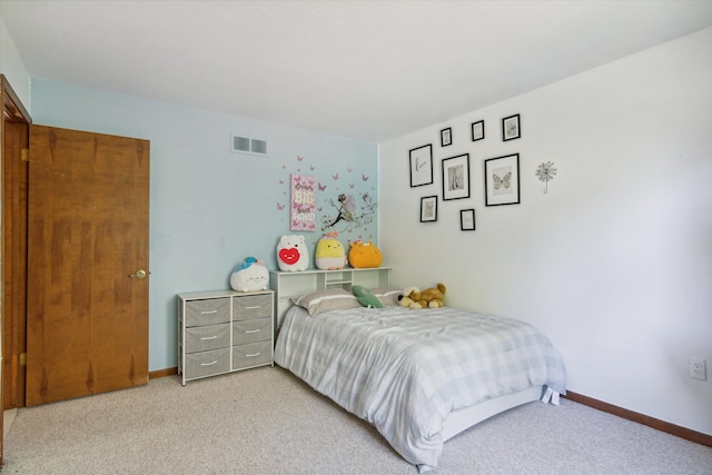 bedroom with light carpet