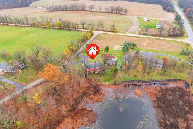 aerial view with a water view and a rural view