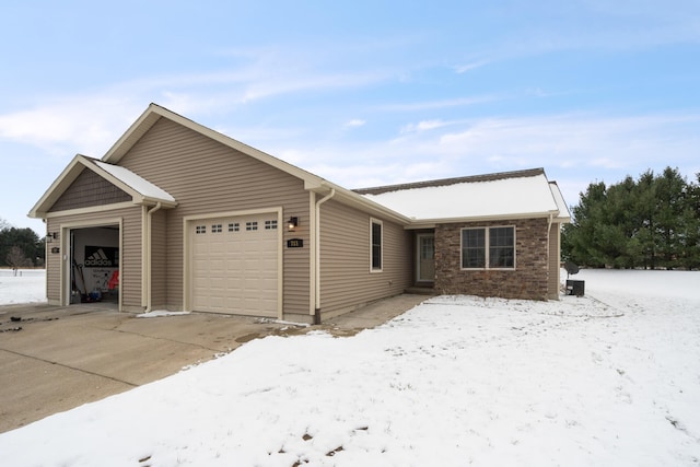 ranch-style home featuring a garage