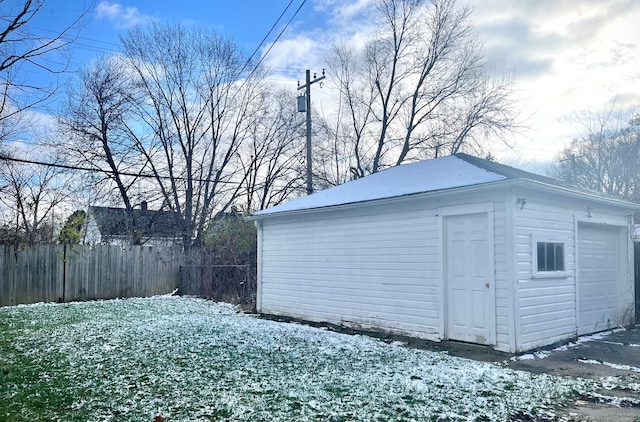 view of snow covered garage