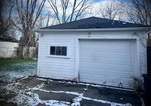 view of snow covered garage