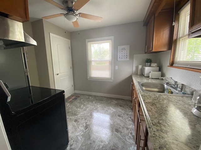 kitchen with exhaust hood, ceiling fan, black / electric stove, and sink