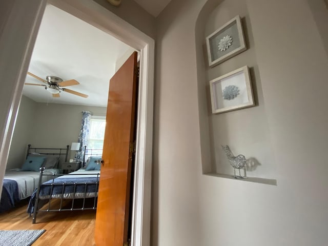 bedroom featuring ceiling fan and hardwood / wood-style floors