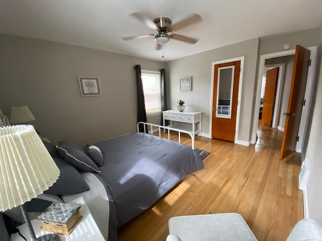 bedroom featuring ceiling fan and light wood-type flooring