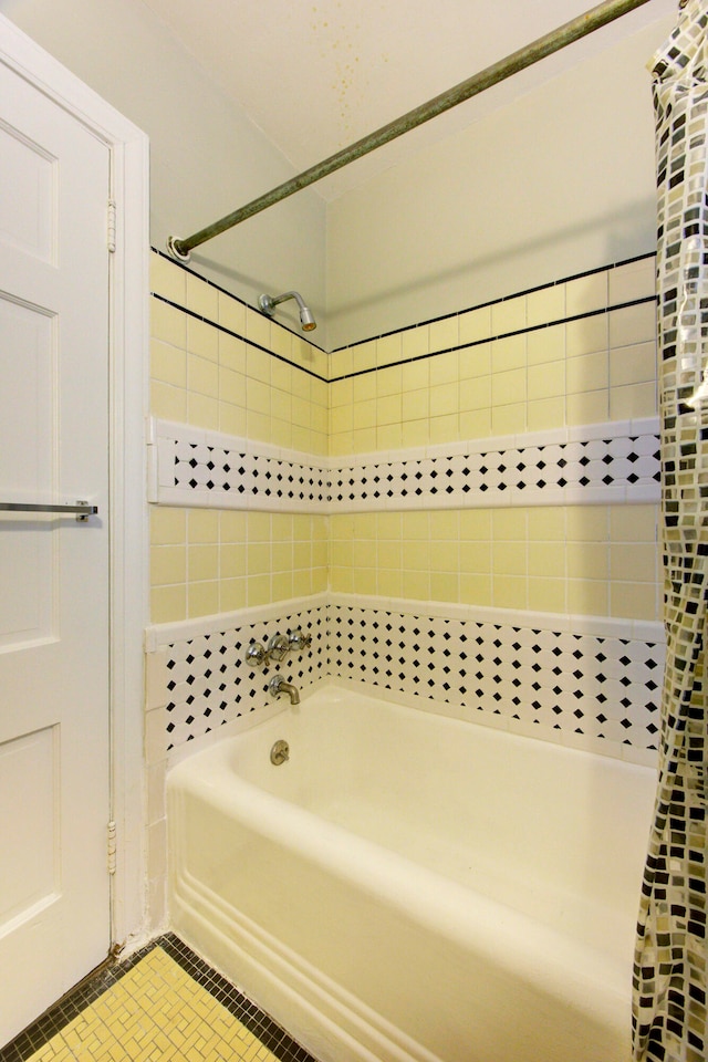 bathroom featuring tile patterned floors and shower / bathing tub combination