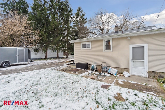 view of snow covered property