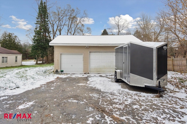 view of snow covered garage