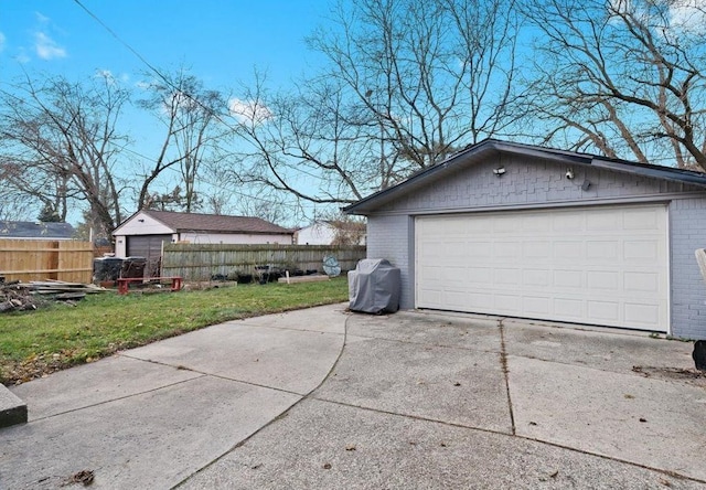 garage with a lawn