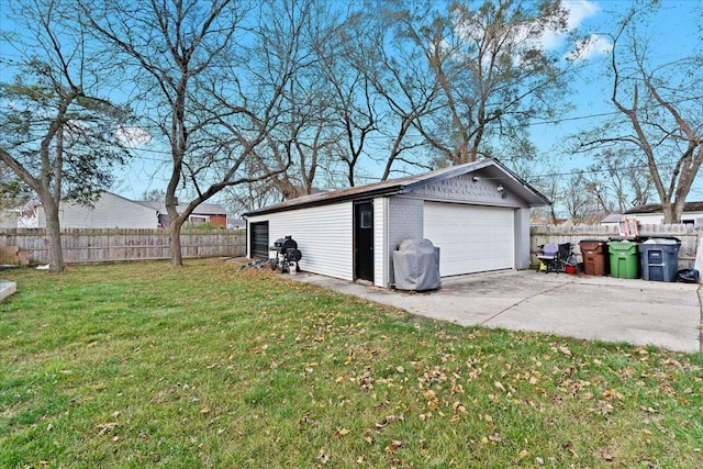 garage with a lawn