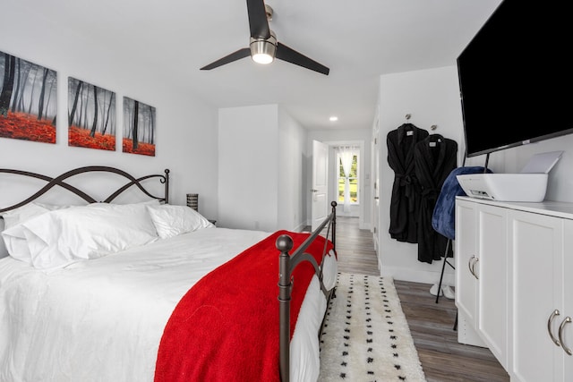 bedroom featuring wood-type flooring and ceiling fan