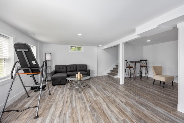 workout room with hardwood / wood-style floors