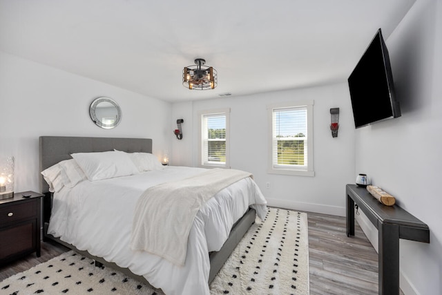 bedroom featuring hardwood / wood-style flooring