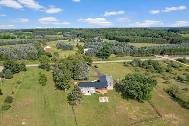 birds eye view of property with a rural view