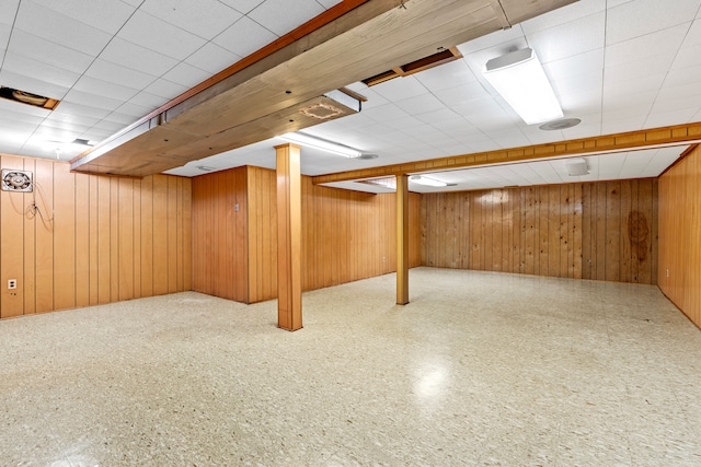 basement with wood walls