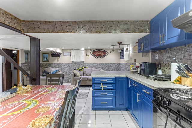 kitchen with backsplash, gas stove, ventilation hood, blue cabinets, and light tile patterned flooring