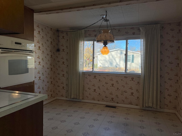 view of unfurnished dining area