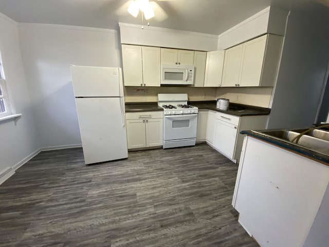 kitchen with ornamental molding, white appliances, ceiling fan, white cabinets, and dark hardwood / wood-style floors