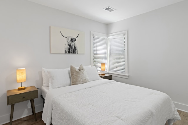 bedroom featuring hardwood / wood-style flooring