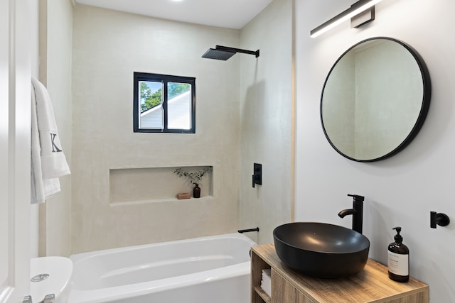 full bathroom with vanity, toilet, and shower / washtub combination