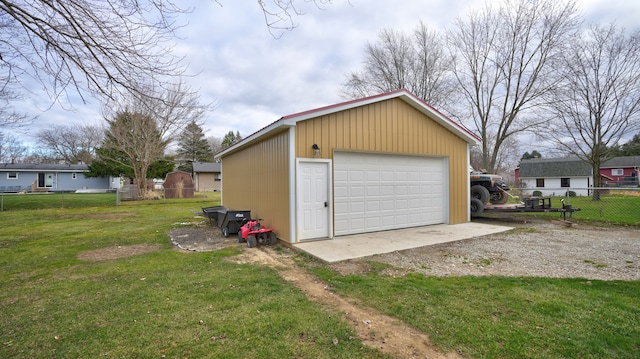 garage with a lawn