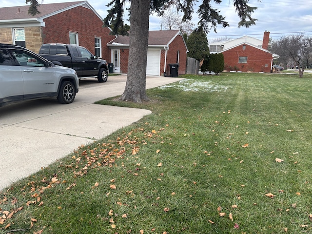 view of yard featuring a garage