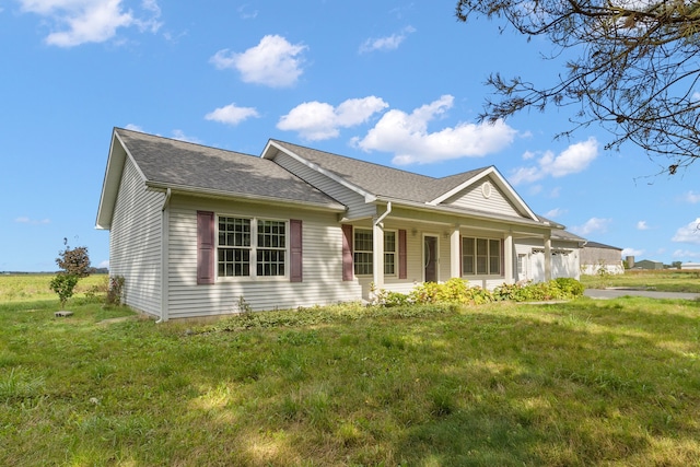 ranch-style house with a front lawn