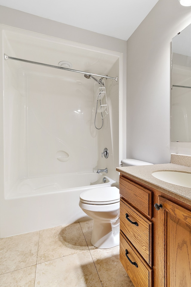 full bathroom with tile patterned floors, vanity, shower / bathtub combination, and toilet