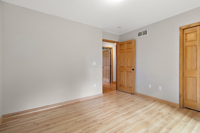 unfurnished bedroom featuring light hardwood / wood-style floors