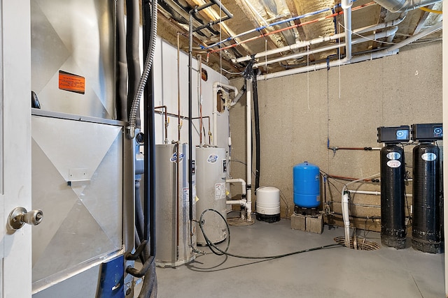 utility room with heating unit, electric water heater, and gas water heater