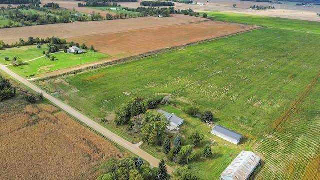 birds eye view of property featuring a rural view