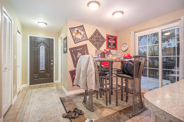 view of tiled dining space