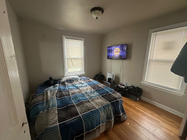 bedroom featuring light wood-type flooring