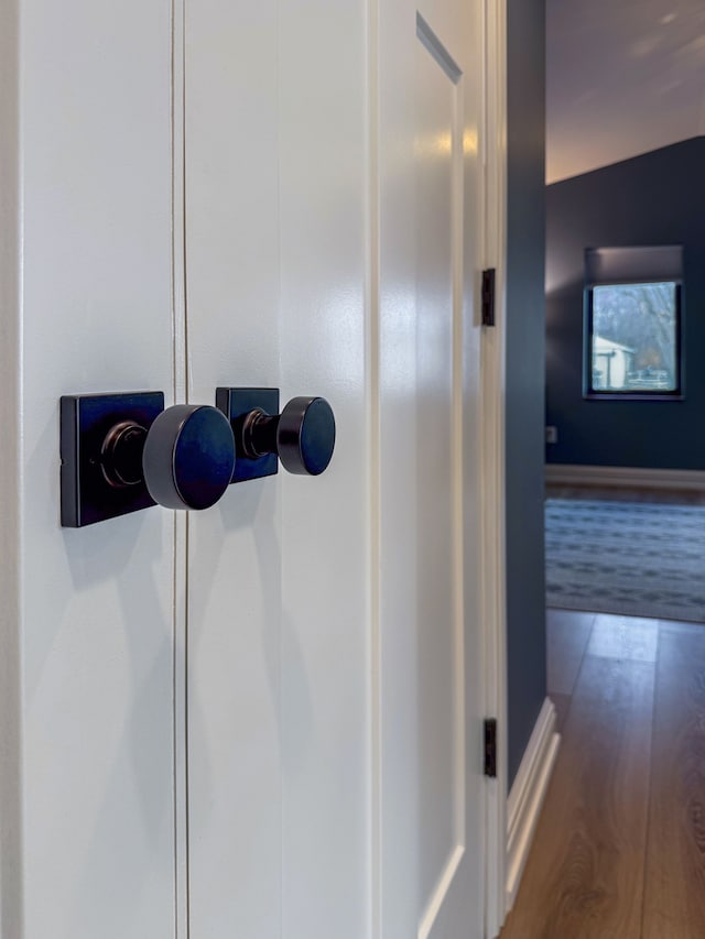 interior details featuring hardwood / wood-style floors