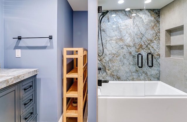 bathroom with hardwood / wood-style flooring and vanity