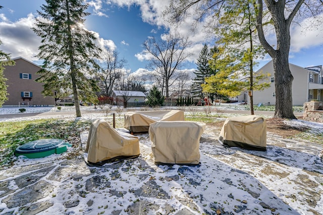 view of snow covered patio