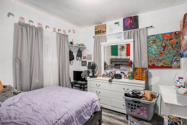 bedroom featuring dark wood-type flooring