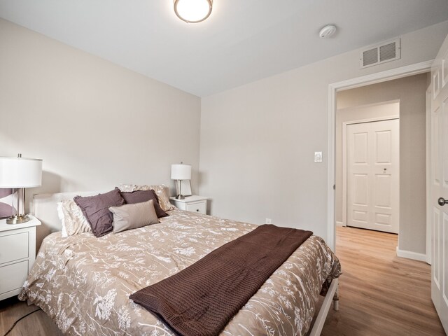 bedroom featuring light hardwood / wood-style floors