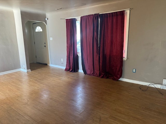 foyer entrance with wood-type flooring