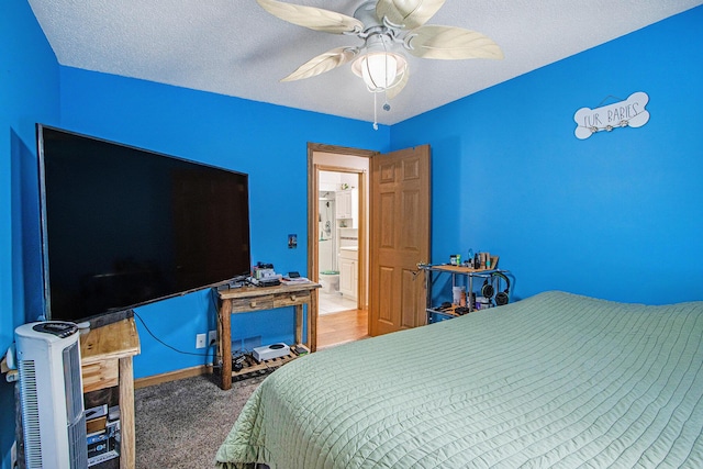 bedroom featuring carpet, a textured ceiling, and ceiling fan